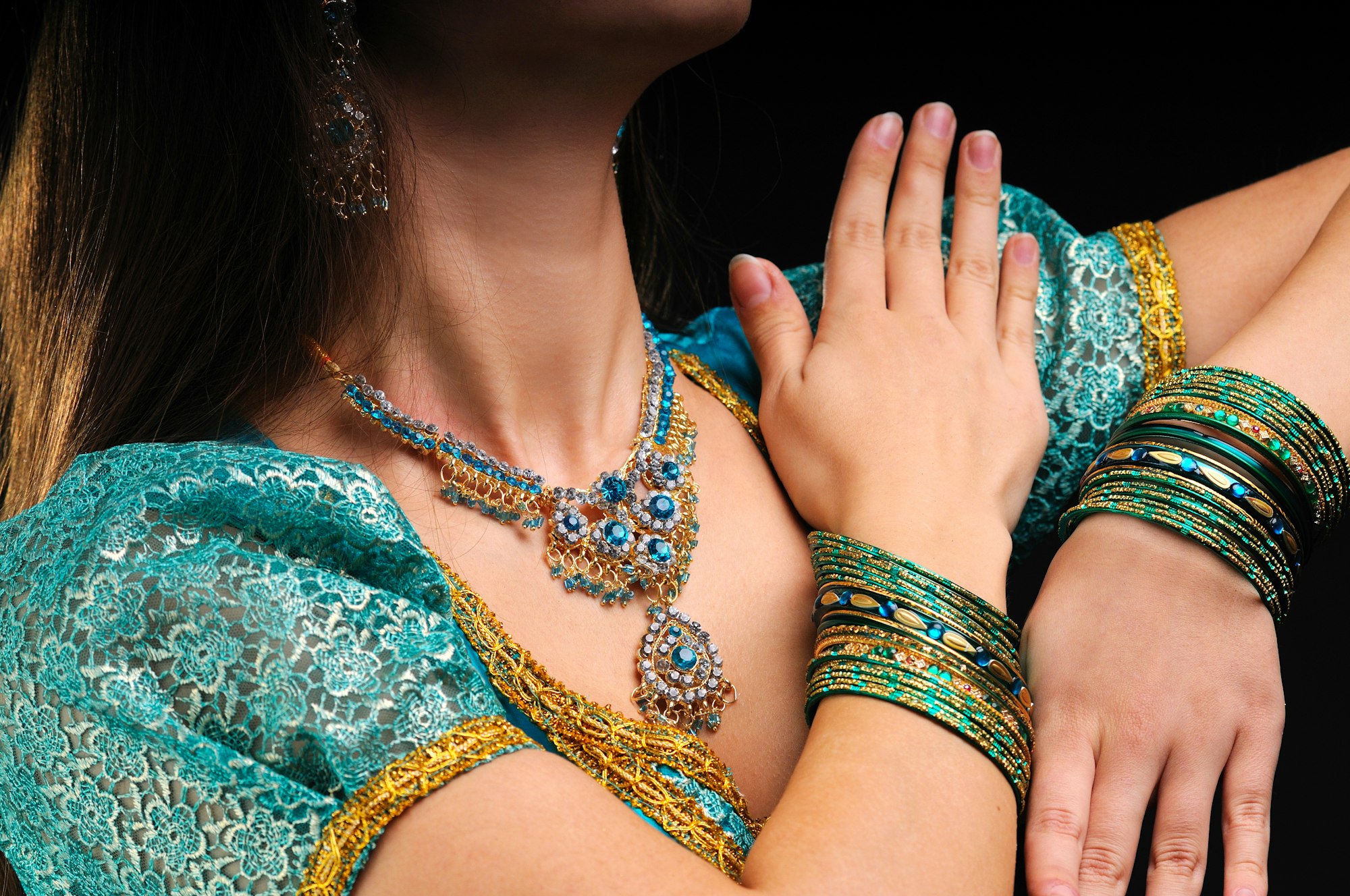Massive jewelry on female body in indian dress